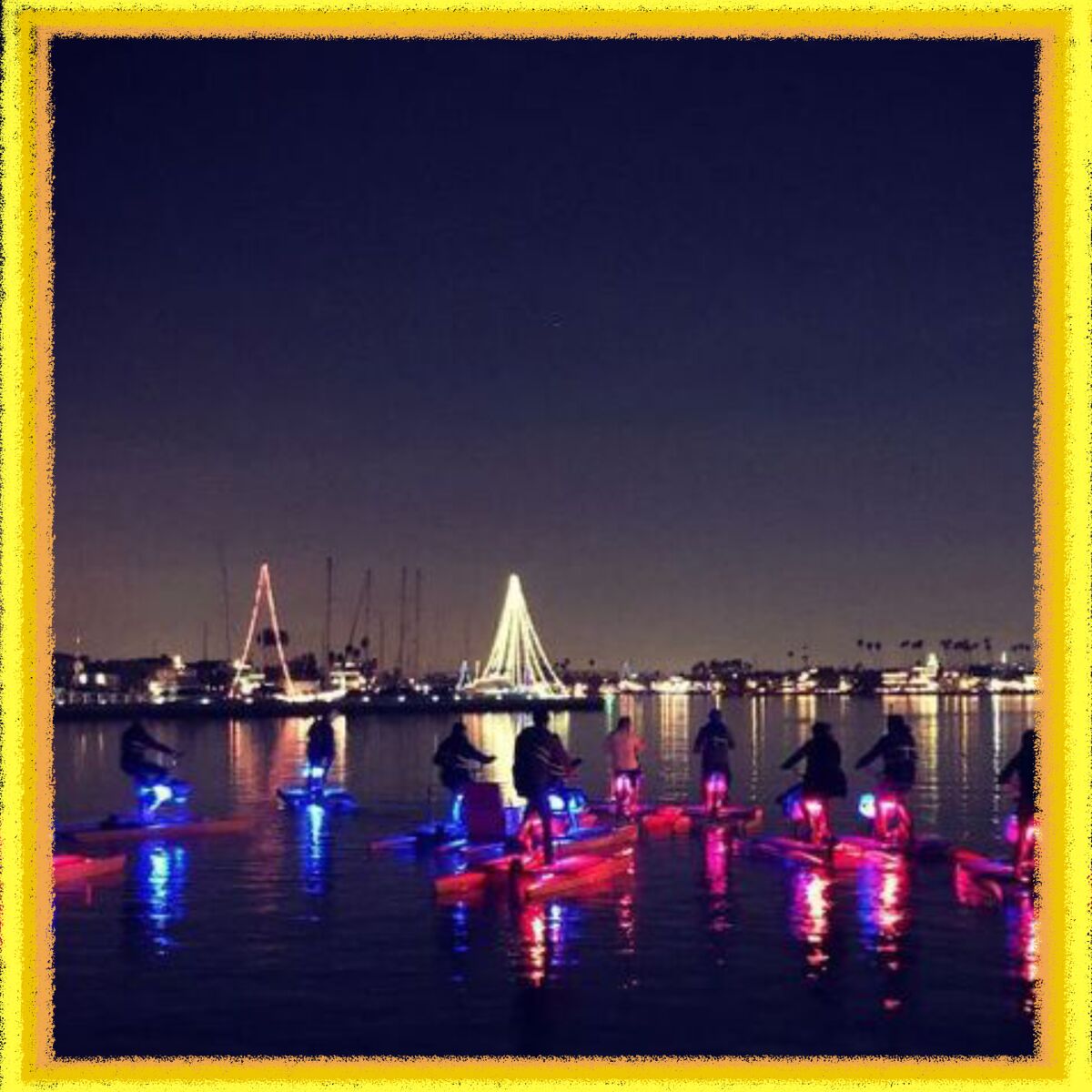 A glowing water bike ride in Long Beach.
