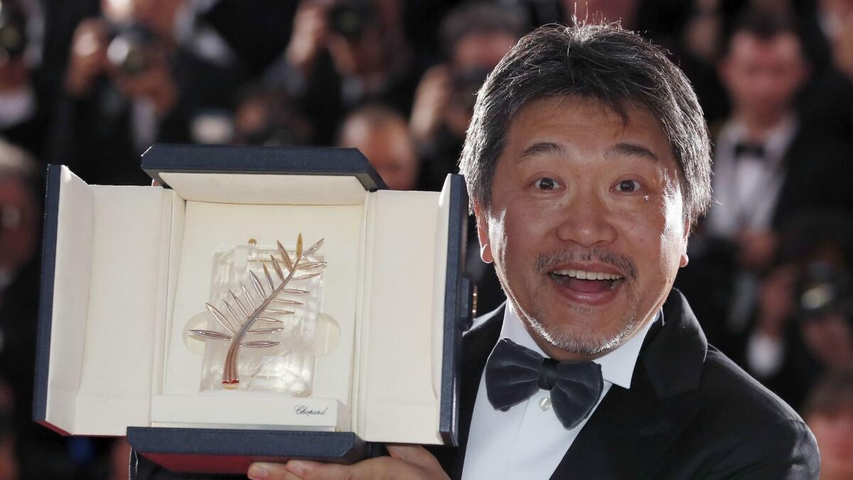 Hirokazu Kore-Eda poses during the Award Winners photocall after he won the Palme d'Or Prize for "Shoplifters" at the 71st annual Cannes Film Festival.