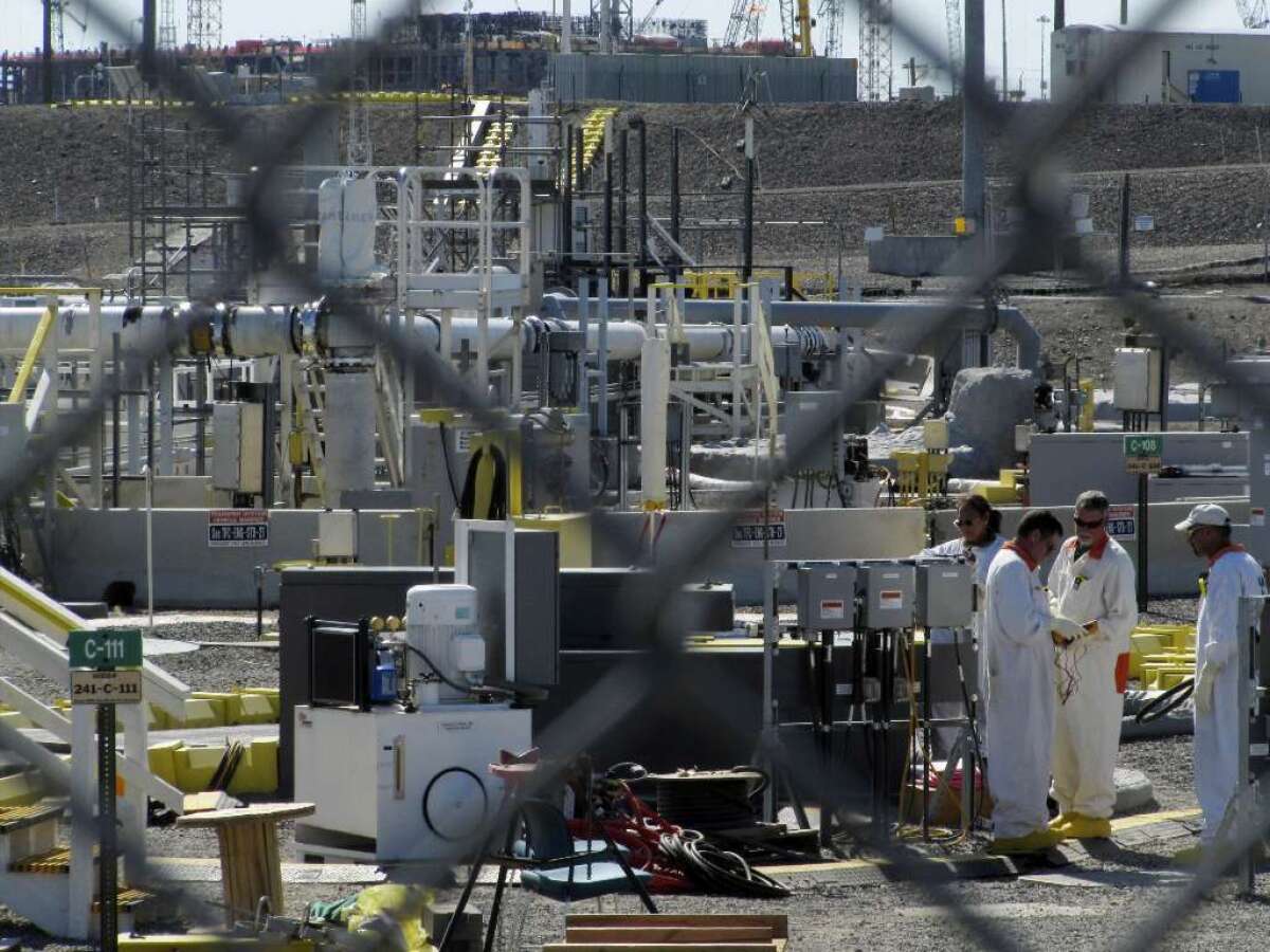 Workers in 2010 at a tank farm at the Hanford nuclear reservation in Washington state, where highly radioactive nuclear waste is stored underground.