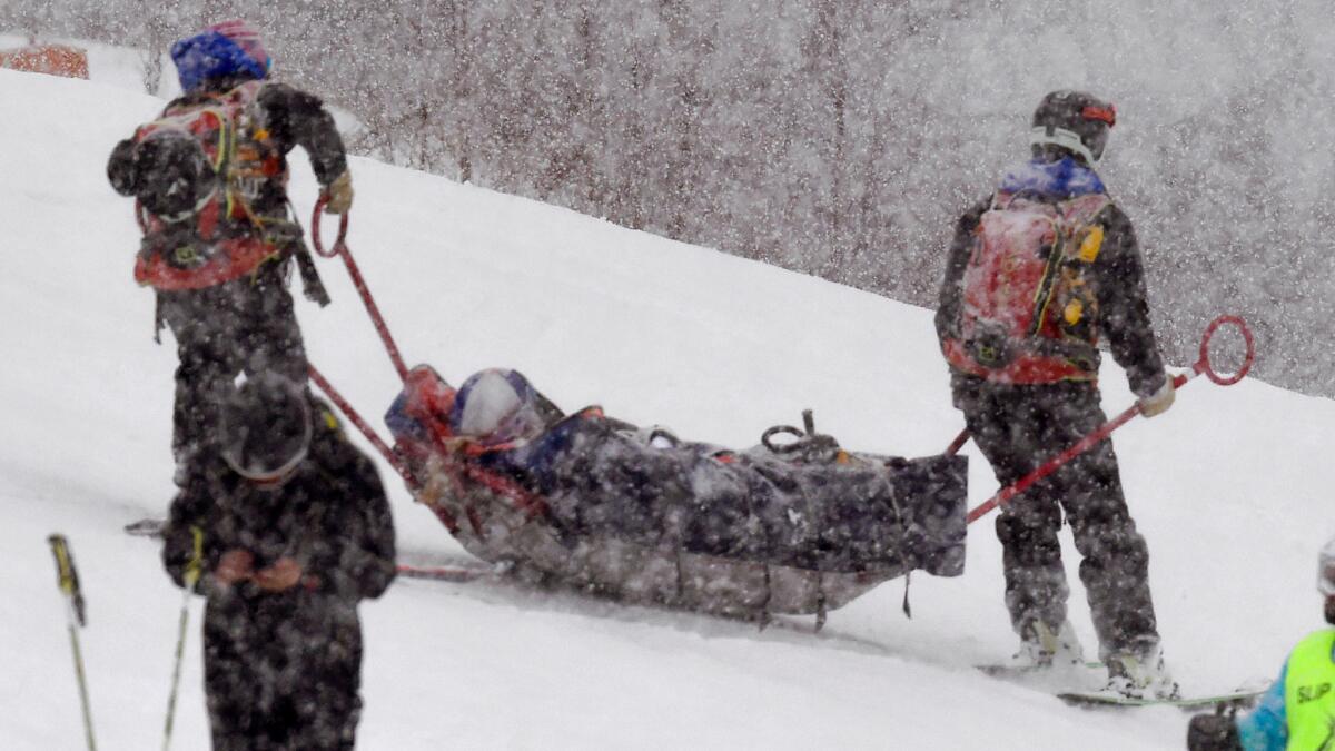 Lindsey Vonn is carried off the course on a rescue sled after crashing during a World Cup women's super-G race on Saturday.