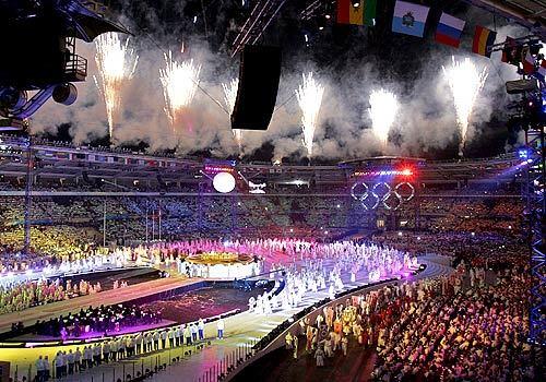 Fireworks ring the Olympic Stadium in Turin, Italy during closing ceremonies.