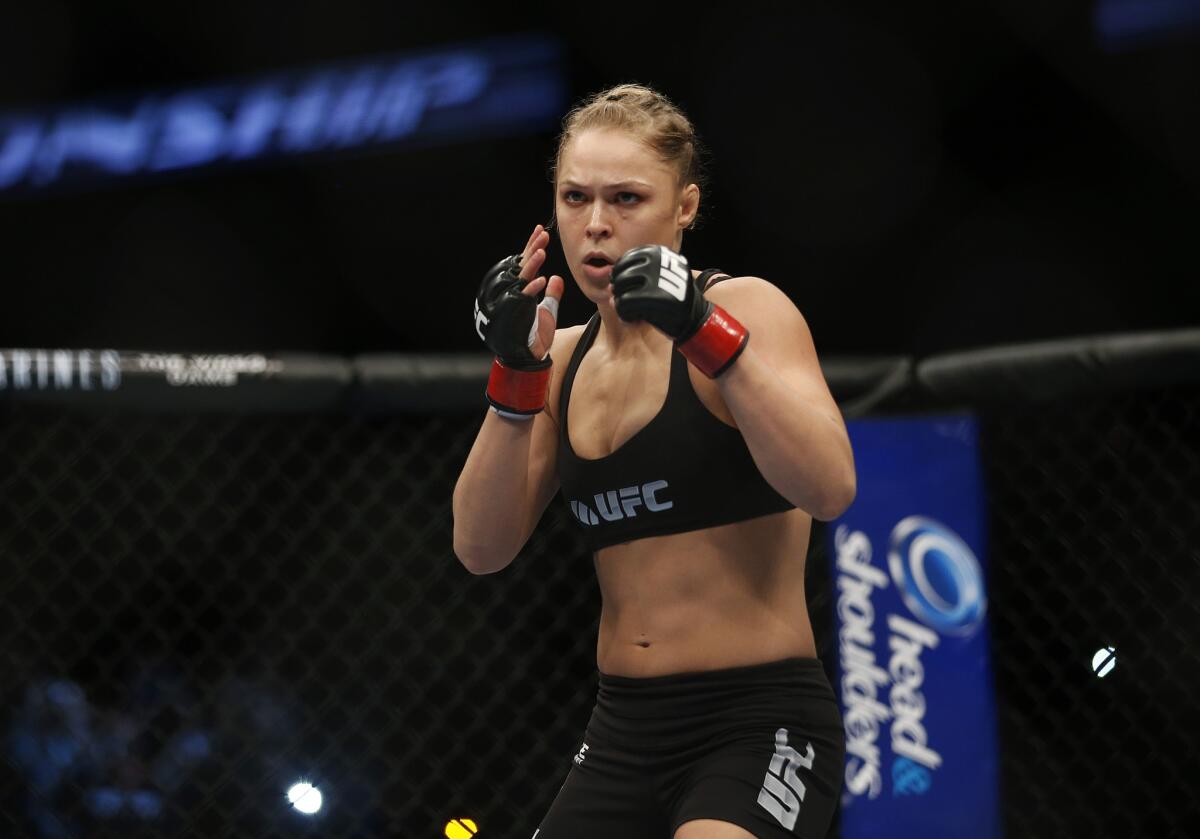 Ronda Rousey gets ready for her women's bantamweight championship fight against Liz Carmouche in Anaheim for UFC 157 on Feb. 23, 2013.