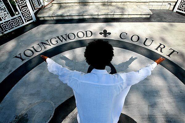 Singer Norwood Young is photographed in front of the Hancock Park home that he calls Youngwood Court.