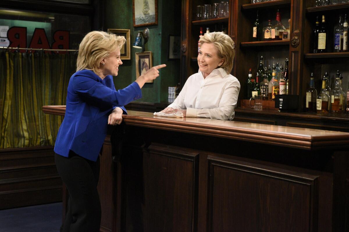 Kate McKinnon as Hillary Clinton, left, and the real Clinton on "Saturday Night Live" in 2015.
