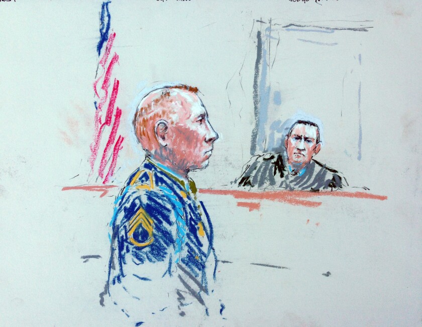 Staff Sgt. Robert Bales appears before Col. Jeffery Nance, the judge, in this courtroom sketch from Joint Base Lewis-McChord, Wash.