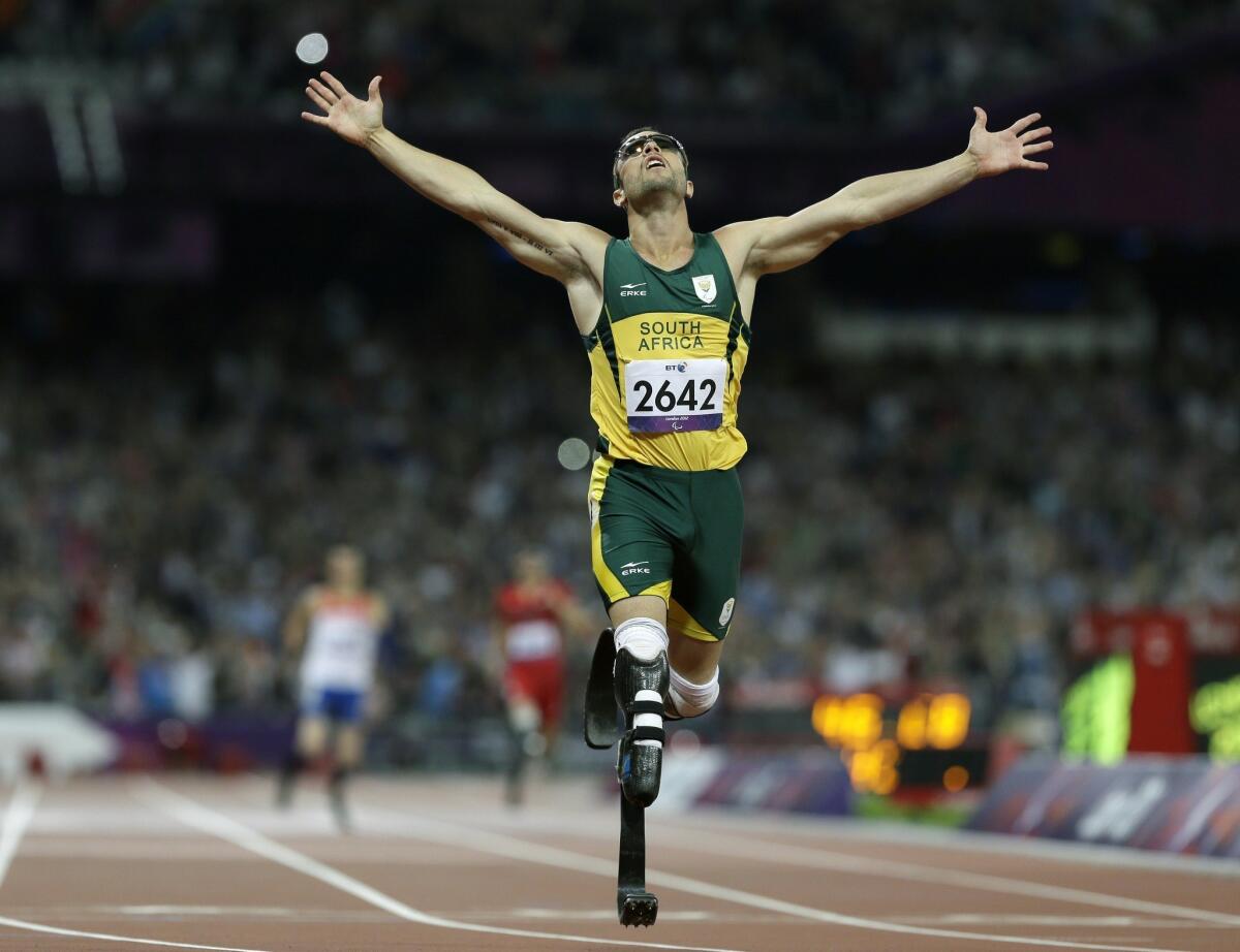 Oscar Pistorius, shown winning the men's 400-meter T44 final at the 2012 Paralympics in London, is awaiting trial for the alleged murder of girlfriend Reeza Steenkamp.