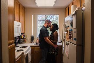 Kashmone Hamilton and Richard Alberts in their apartment in La Mesa on June 2, 2021. The couple got engaged on September 5, 2020 and have been together since December 2017.