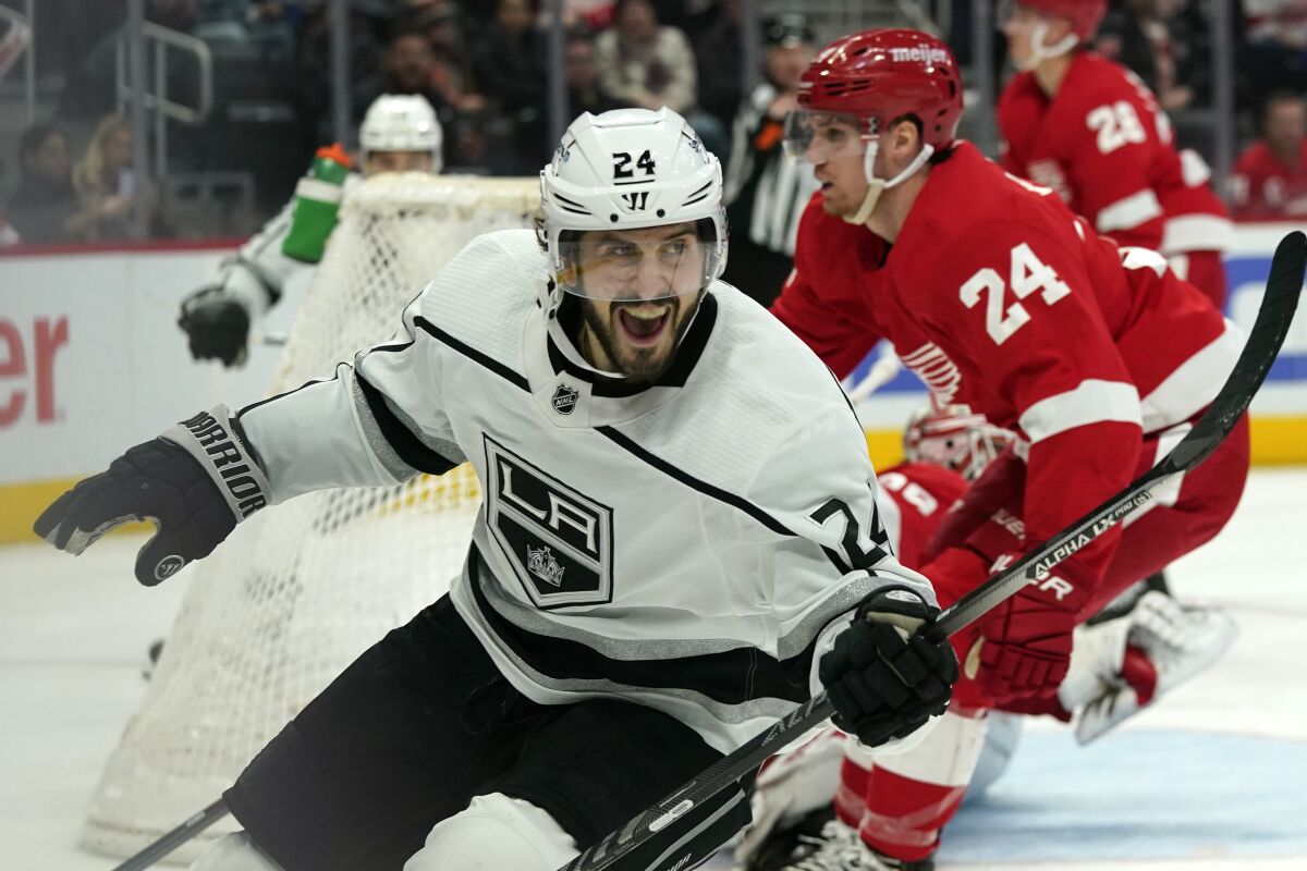 Los Angeles Kings center Phillip Danault (24) celebrates his goal against the Detroit Red Wings in the third period of an NHL hockey game Wednesday, Feb. 2, 2022, in Detroit. (AP Photo/Paul Sancya)