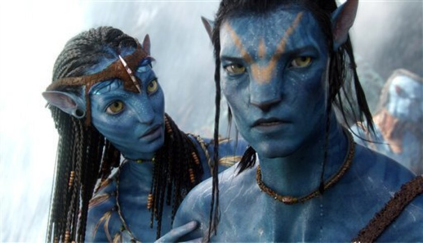 In this film publicity image released by 20th Century Fox, the character Neytiri, voiced by Zoe Saldana, and the character Jake, voiced by Sam Worthington are shown in a scene from, "Avatar." (AP Photo/20th Century Fox)