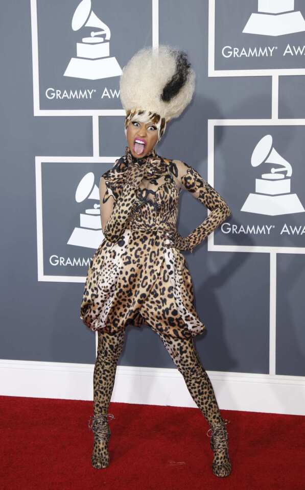 Minaj sports a leopard suit designed by Givenchy.