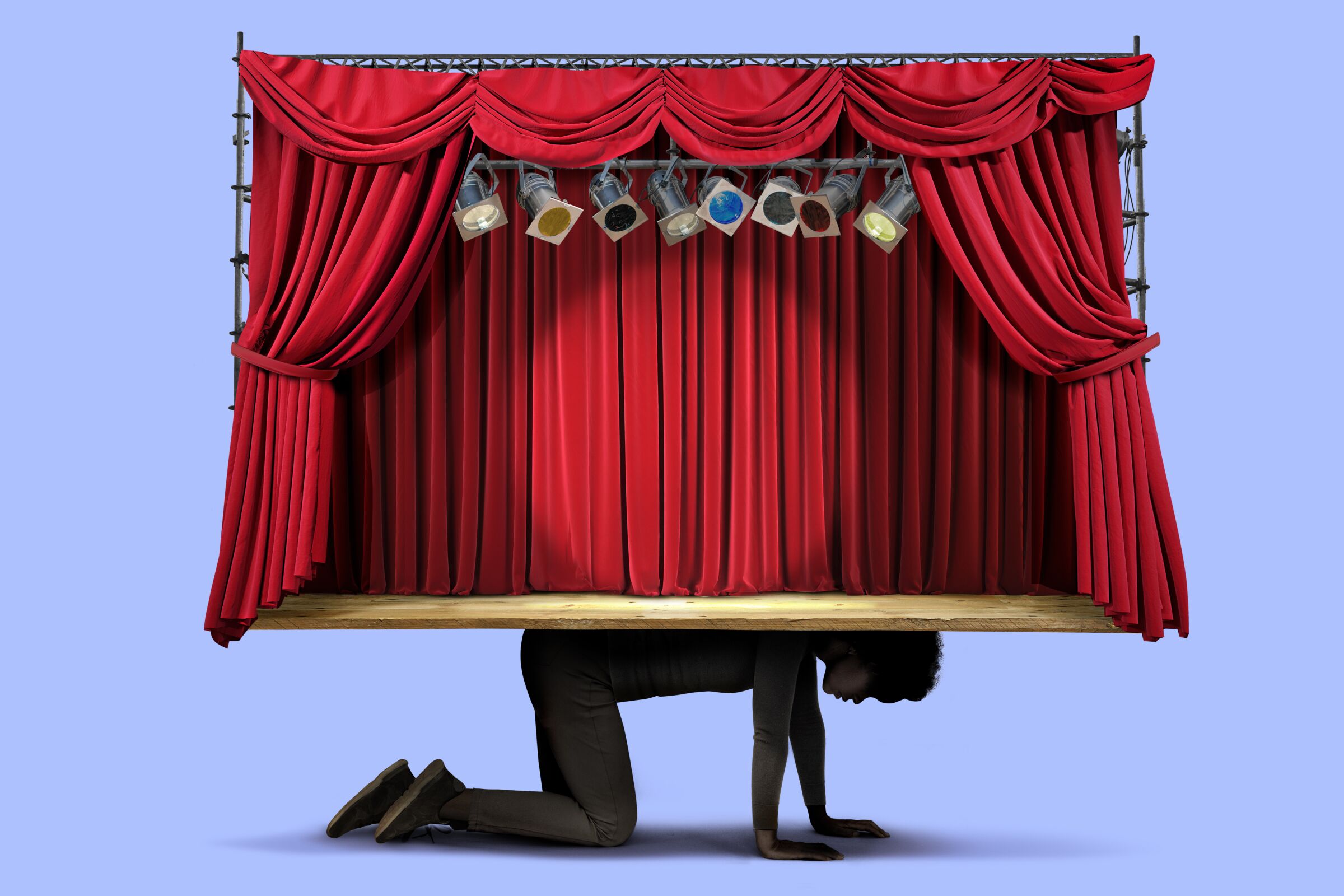 An illustration of a theater stage sitting on a person's back.