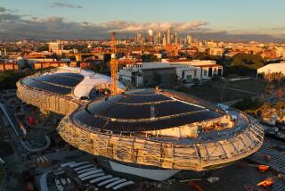 Los Angeles, CA - December 12, 2022: Lucas Museum of Narrative Art under construction in , Los Angeles, CA on Monday, December 12, 2022:. (Allen J. Schaben / Los Angeles Times) The $1-billion Lucas Museum of Narrative Art, which is rising in Exposition Park, has pushed back its opening date from 2023 to 2025. The two-year delay, the museum says, is due to pandemic complications, specifically supply chain issues that have made the procuring of certain construction materials difficult. "It's not one thing, it's an accumulation of things," Lucas Museum Director Sandra Jackson-Dumont says in an interview. "It's definitely supply chains, delays in getting materials, manufacturer issues, there are all these pieces that have together created this kind of impact on the schedule." The museum broke ground in March 2018 and "topped out" - the term for setting the final beam within its steel structure in place - in March 2021. In April 2021, the museum pushed its targeted 2022 debut by a year because of pandemic-related delays. COVID-19 health and safety protocols had slowed construction, it said at the time. Now, Jackson-Dumont says, two more years are needed not only for construction, but to also make sure the finished building is suitable to house art. "We wanted to give ourselves time, once the building is complete, to make sure the building goes through the proper readiness and remediation processes, so we can ensure the artwork is safe coming into the building," Jackson-Dumont says, referring to temperature controls and other environmental conditions. "And that process - the mitigation - really takes a period of time." The timeline delay, Jackson-Dumont says, will not affect the projected cost of the building. "The budget - that's where we are and we had a contingency in place," she says. Filmmaker George Lucas and wife Mellody Hobson are "the primary funding source" for the museum. Should the cost go up, Jackson-Dumont s