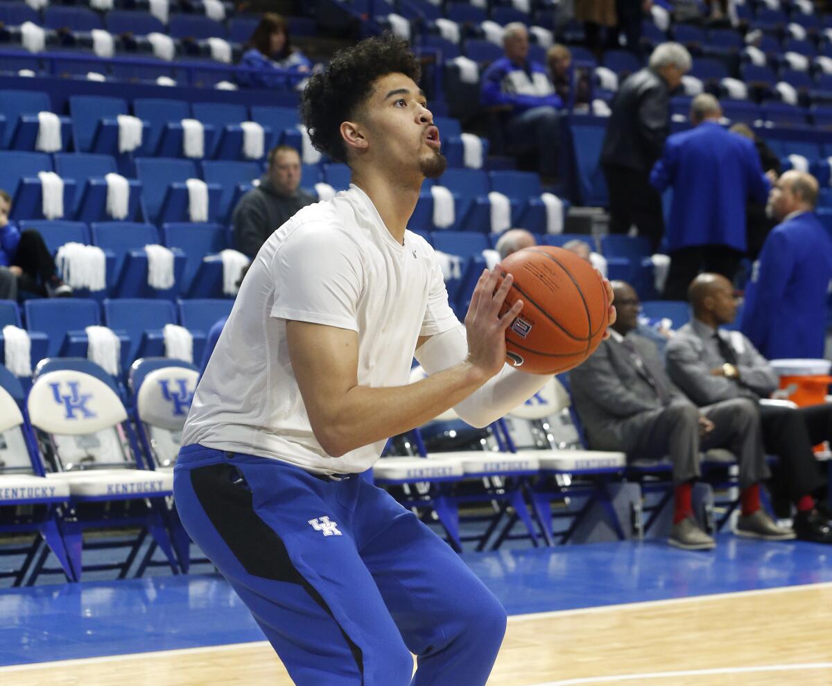 Johnny Juzang warms up before a game on March 3, 2020, at Lexington, Ky.
