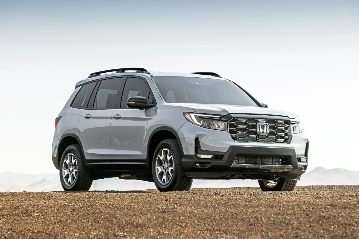 This photo provided by Honda shows the 2022 Honda Passport, a midsize two-row SUV that received bolder styling for the 2022 model year. (Courtesy of American Honda Motor Co. via AP)