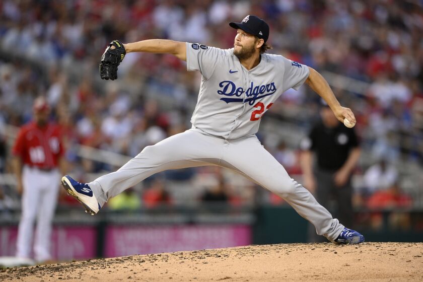 Los Angeles Dodgers starting pitcher Clayton Kershaw delivers during the fourth inning of a baseball game against the Washington Nationals, Saturday, July 3, 2021, in Washington. (AP Photo/Nick Wass)