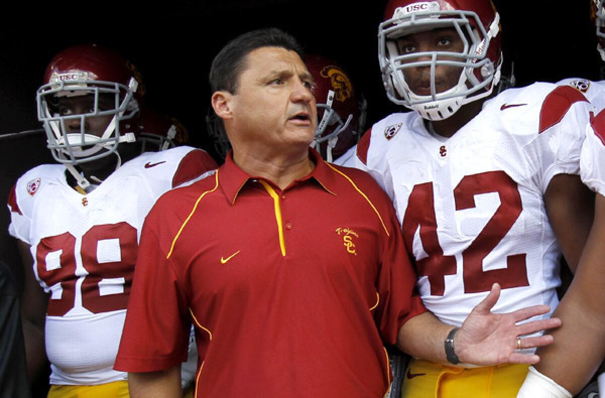 USC assistant coach Ed Orgeron is shown just before the start of the Trojans' game against Hawaii at Aloha Stadium in 2009.