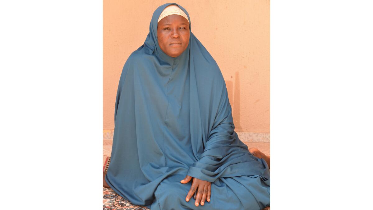 Hadiza Mala, 40, married a man in her village outside the town of Gwoza, unaware that he was a commander in the Nigerian militant group Boko Haram. She betrayed him to Nigerian authorities, who did nothing.