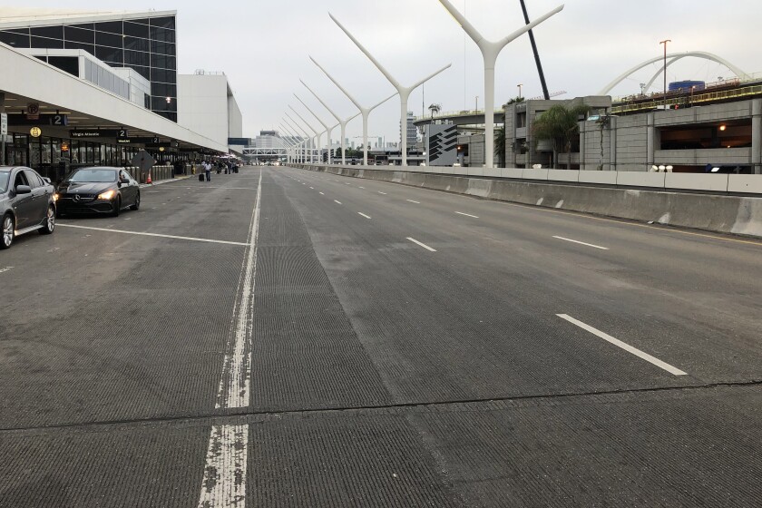 The departure level at LAX was shut down Friday morning after a report of a suspicious vehicle at Terminal 5.