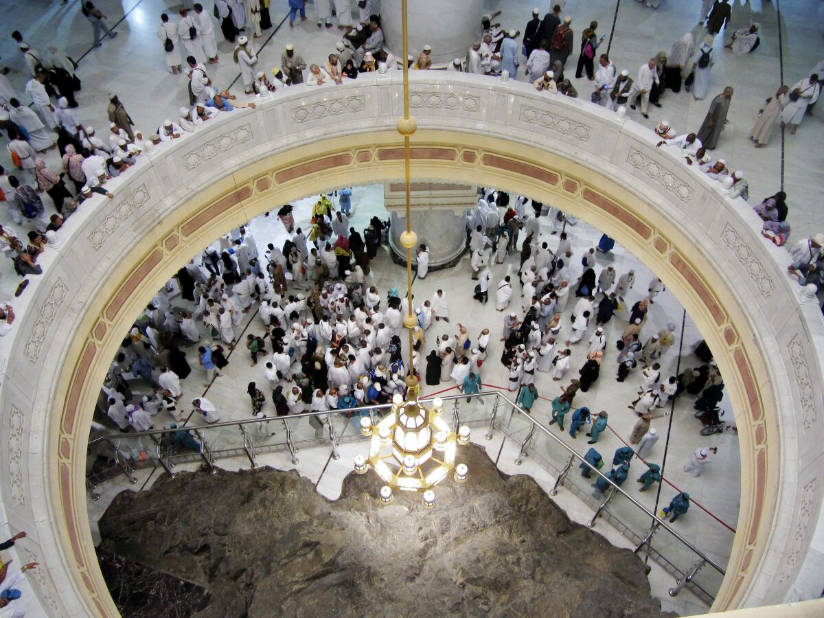 Pilgrims pray near Safa hill at the Grand Mosque during the hajj in Mecca, Saudi Arabia.