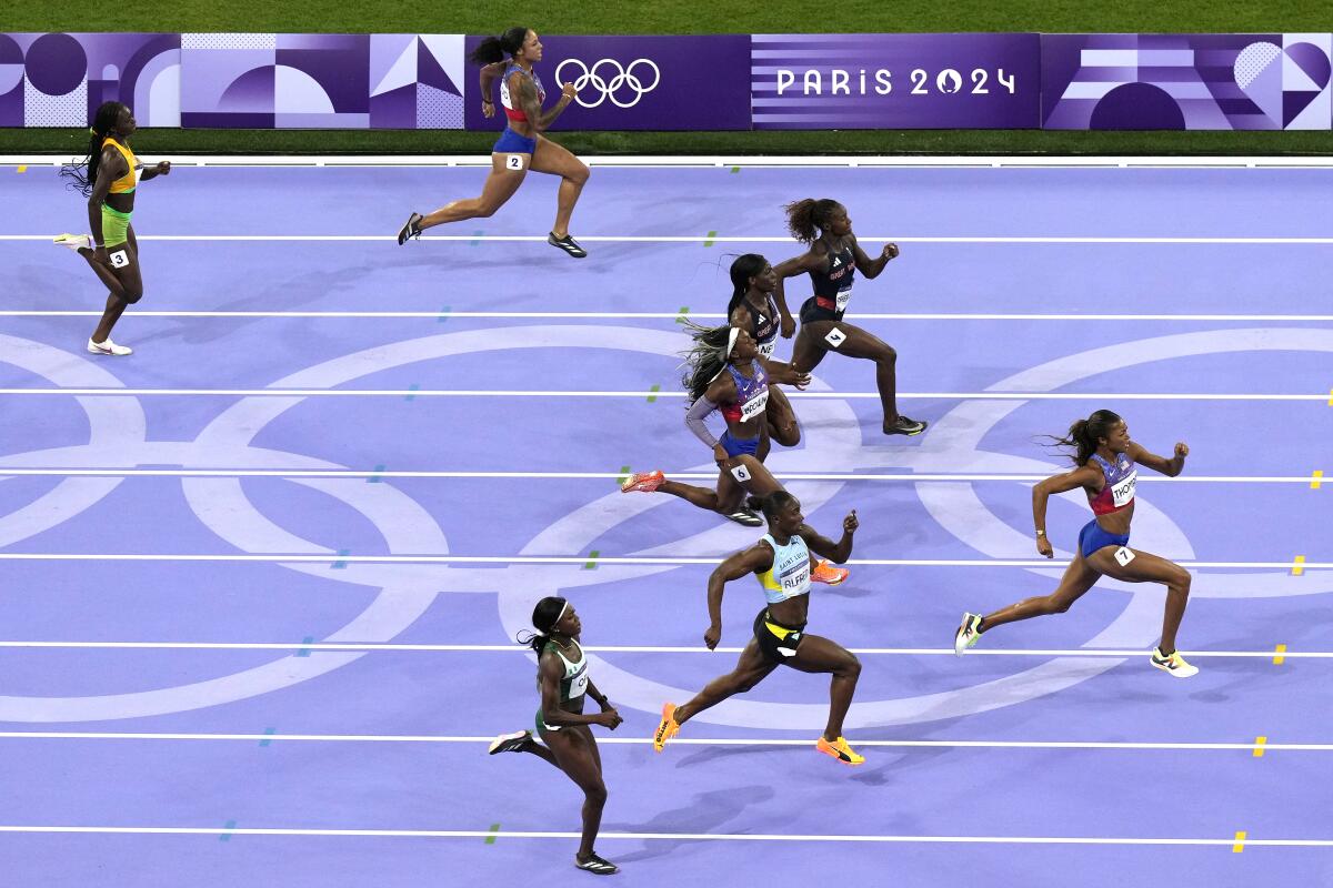 Gabby Thomas leads the field in the women's 200-meters final.