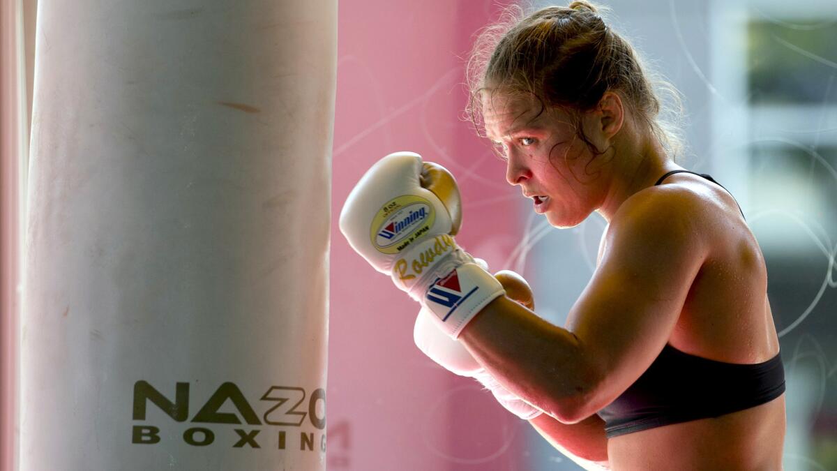 Ronda Rousey works out at the Glendale Fighting Club earlier this summer.