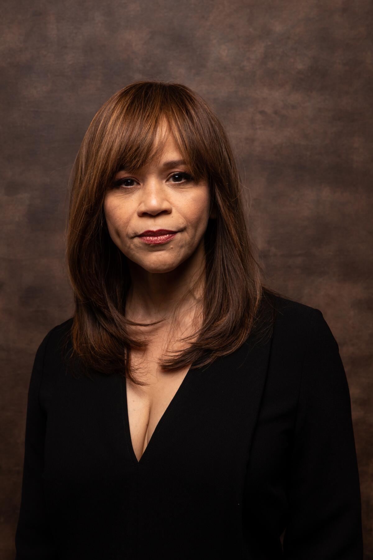 Actor Rosie Perez stares directly at the camera in a portrait taken at the Sundance Film Festival