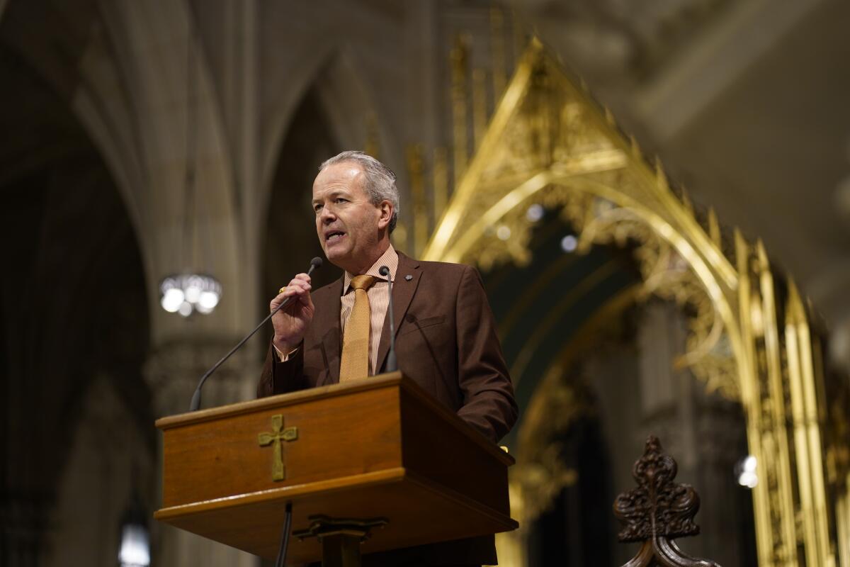 Timothy R. Busch addresses the congregation before Mass at St. Patrick's Cathedral in New York City.