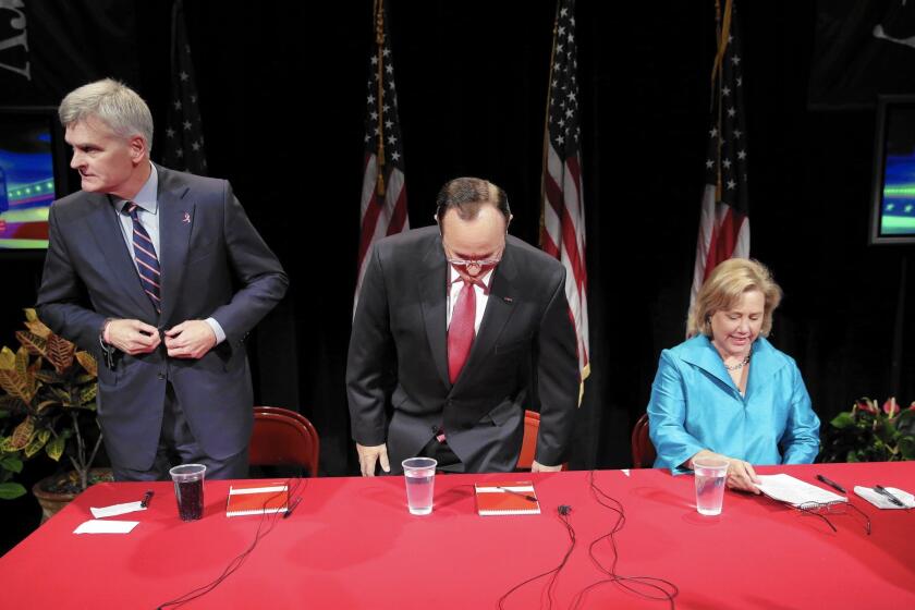 Rep. Bill Cassidy (R-La.), left, tea party candidate Rob Maness and Sen. Mary L. Landrieu (D-La.) at a debate in Shreveport on Oct. 14. Landrieu is hoping that Cassidy and Maness will split the GOP vote on Nov. 4, allowing her win reelection.