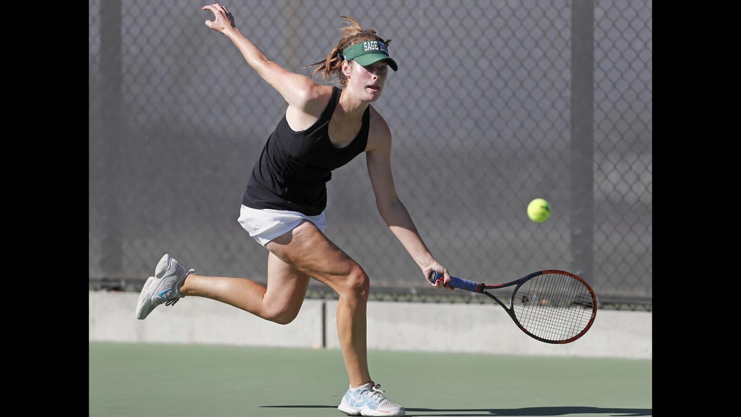 Sage Hill School's Morgan Mann competes in a No. 1 singles set against Beckman in the first round of the CIF Southern Section Division 1 playoffs in Newport Beach on Wednesday, Oct. 31.