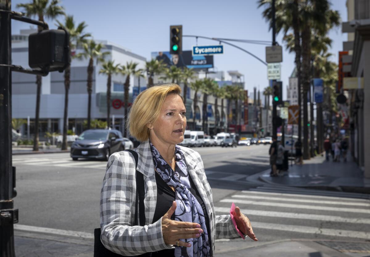 Gina Viola walking in Hollywood