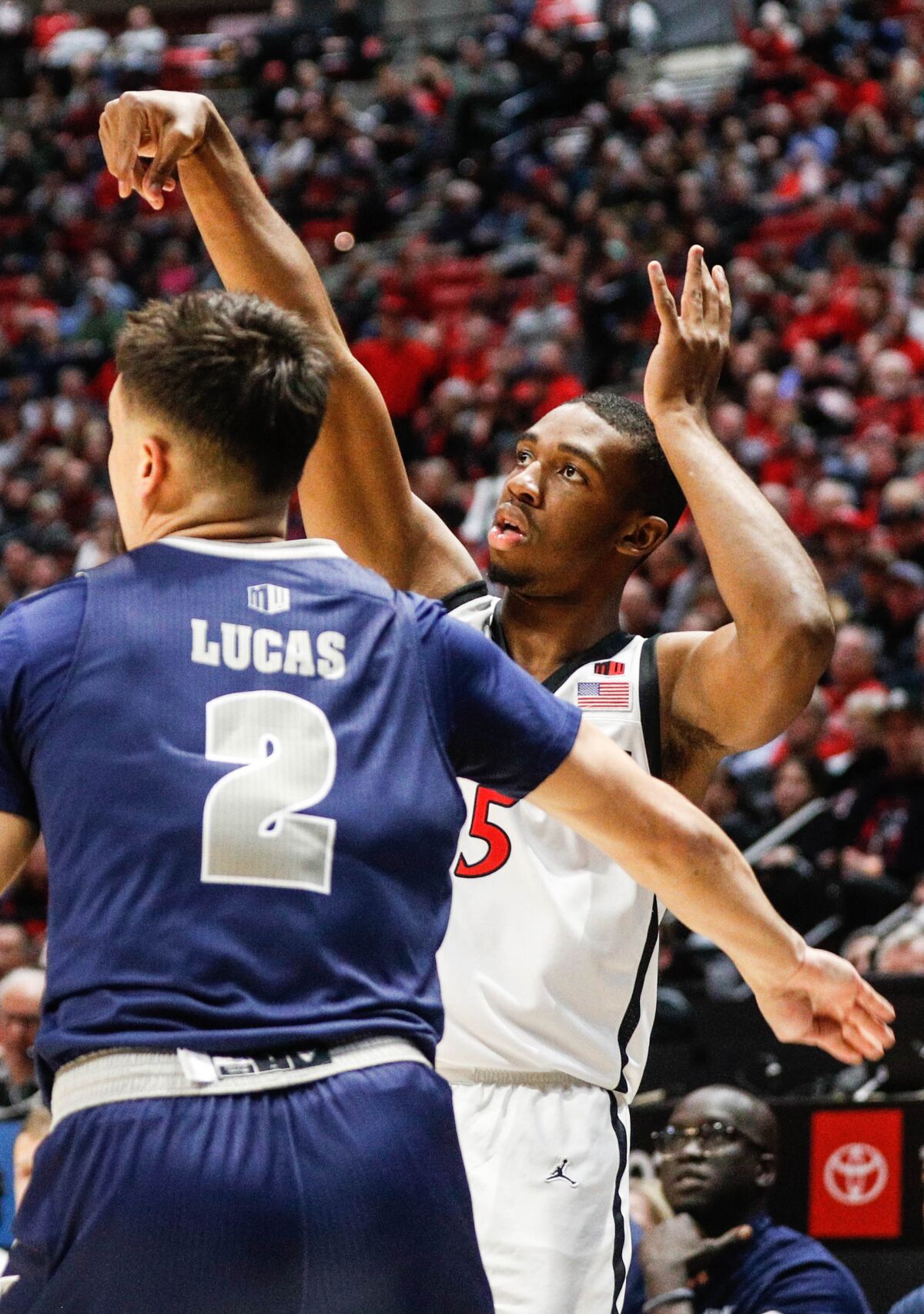 Nevada's Jarod Lucas, seen guarding SDSU's Lamont Butler earlier this season, has a well-earned reputation for flopping.