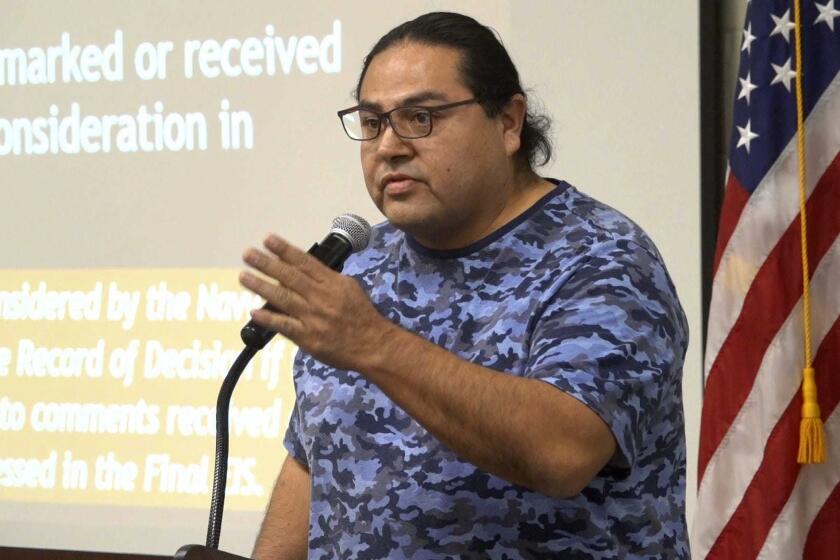 In this April 26, 2020 photo Myron Dewey, a filmmaker and member of the Walker River Paiute Tribe, speaks out against a proposed expansion of the Fallon Naval Air Station during a public meeting in Fallon, Nev. Dewey, who helped draw worldwide attention to the concerns of Native Americans fighting an oil pipeline near the Standing Rock Sioux Reservation died Sunday, Sept. 26, 2021, after his car crashed in rural Nevada. (Benjamin Spillman/The Reno Gazette-Journal via AP, File)