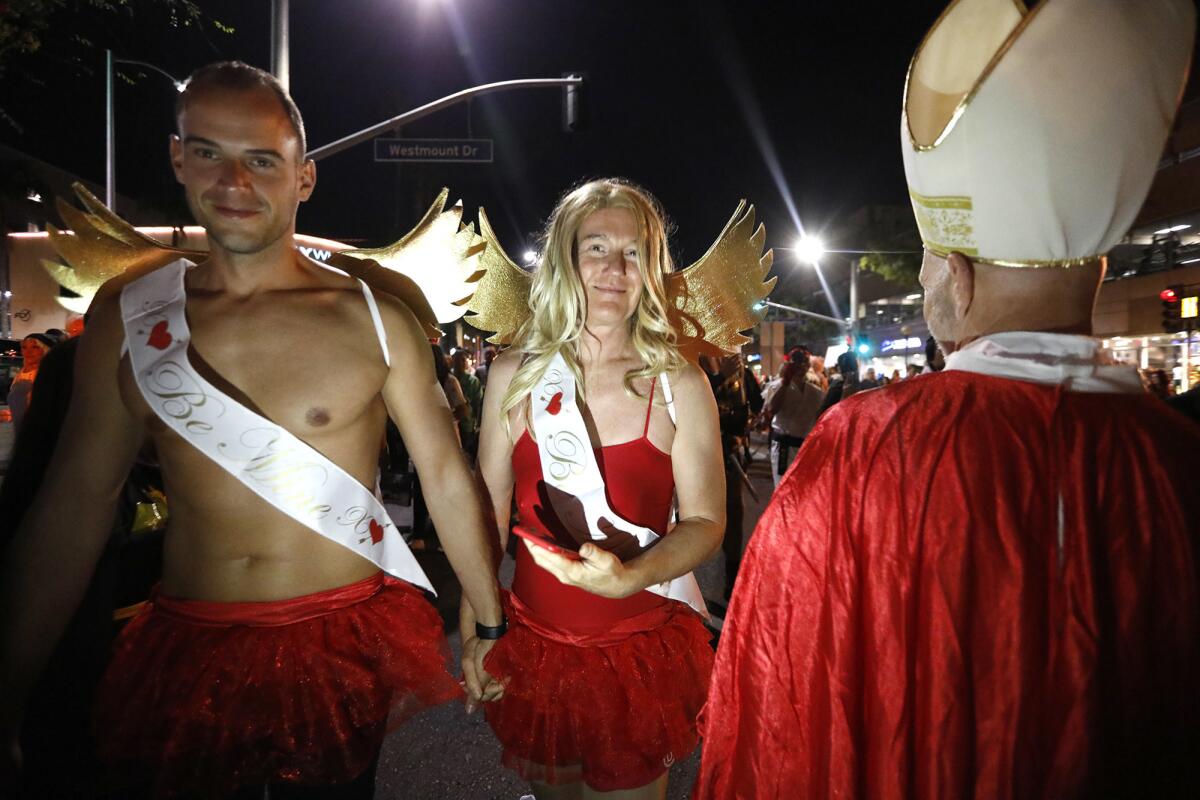 Costumed revelers participate in the annual Halloween Carnaval.
