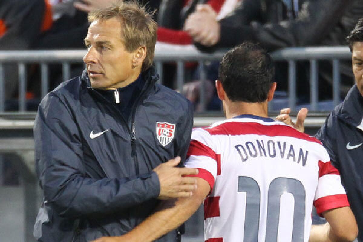U.S. national soccer Coach Juergen Klinsmann, left, has kept Landon Donovan off the team since the player returned from a three-month sabbatical from the sport earlier this year.