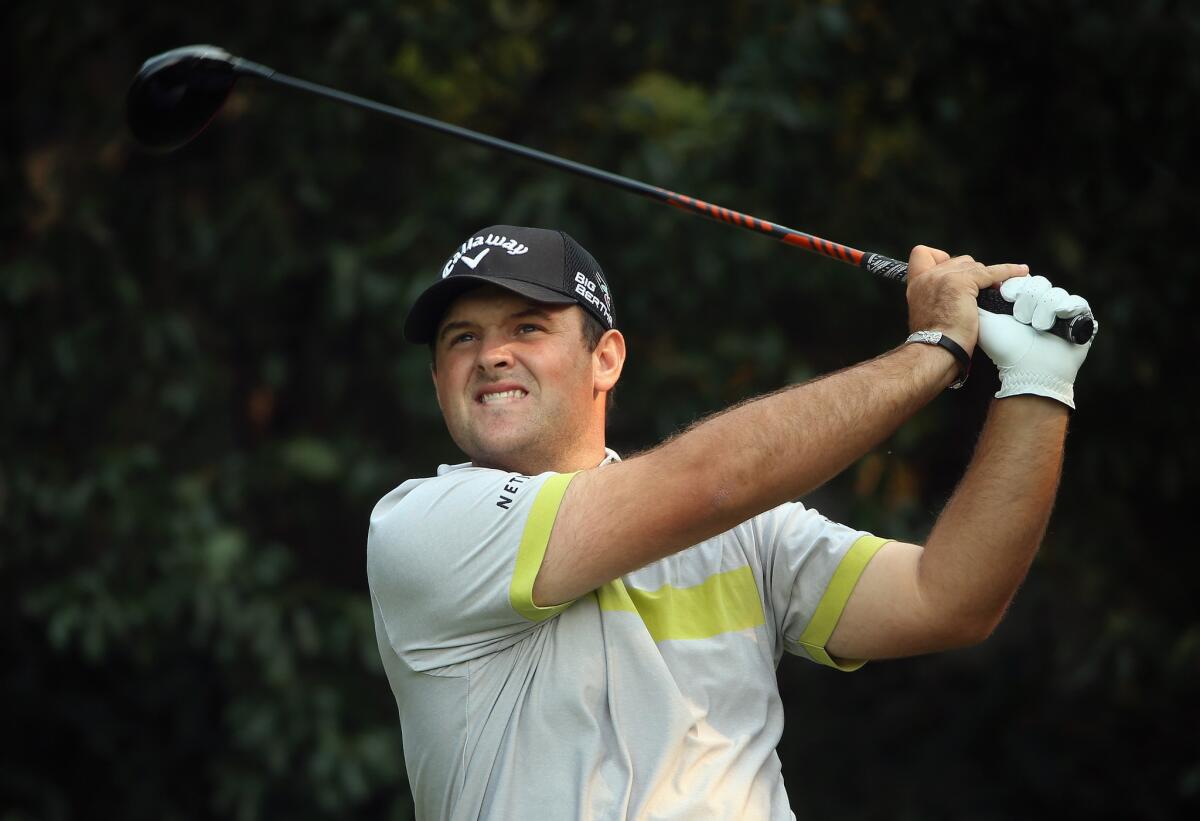 Patrick Reed hits his tee shot on the fifth hole Thursday during the HSBC Champions at the Sheshan International Golf Club in Shanghai.