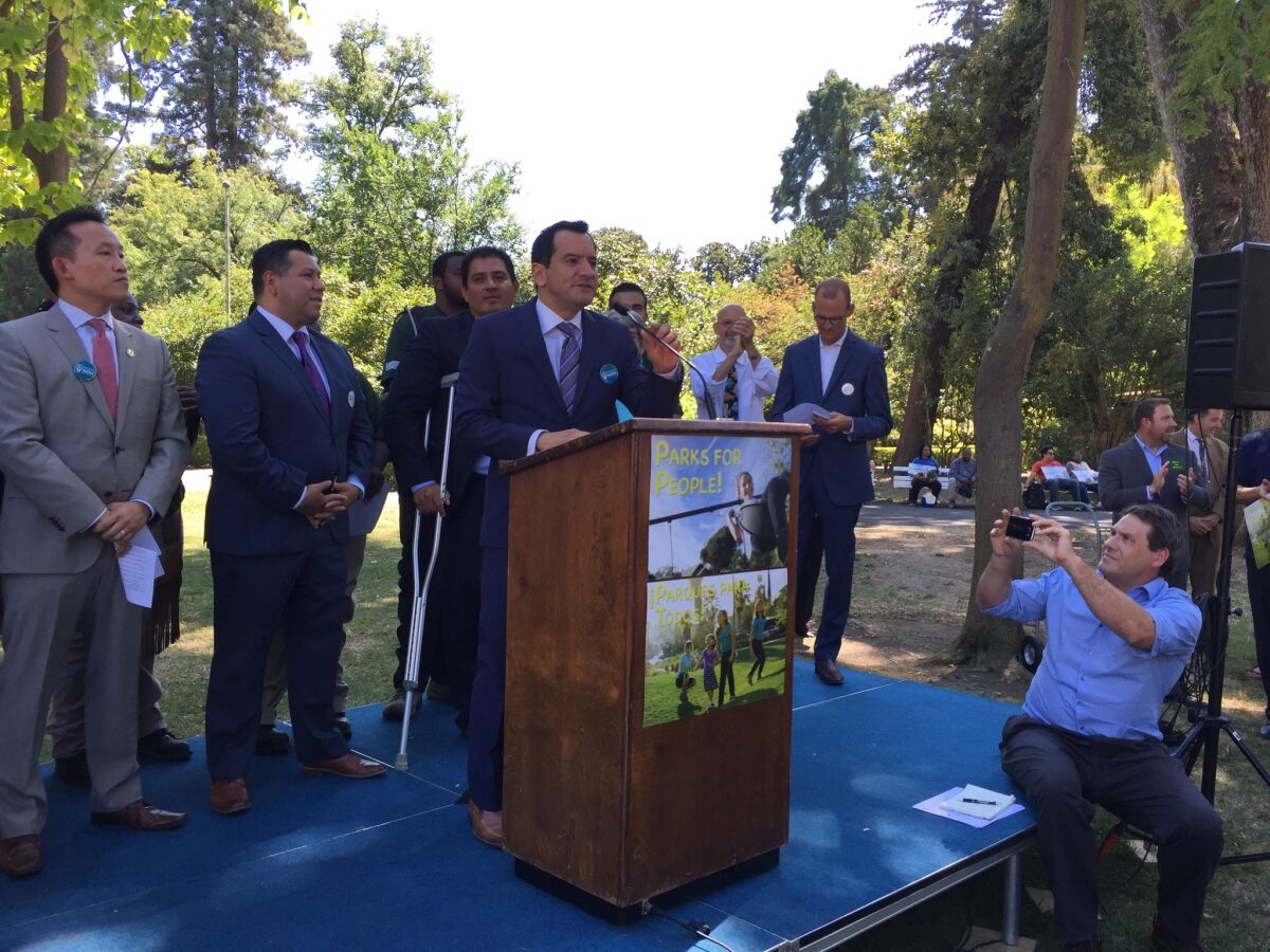 Assembly Speaker Anthony Rendon (D-Paramount) speaking at a rally outside the Capitol for parks spending.