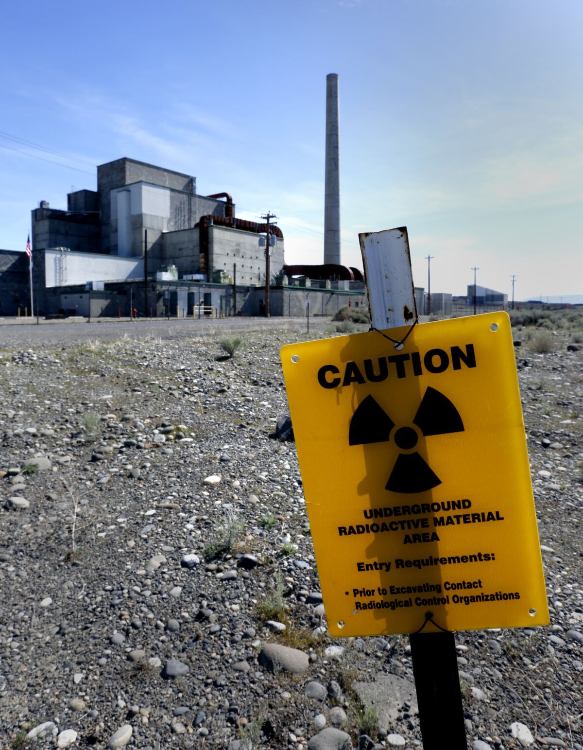Signs remind visitors approaching the B Reactor on the Hanford Nuclear Reservation in south-central Washington in 2016.