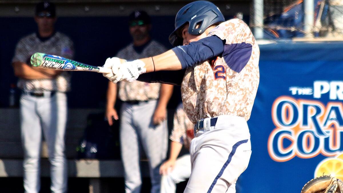 Pepperdine second baseman Hutton Moyer lines a pitch for a hit against Clemson in the Fullerton Regional of the NCAA tournament on Saturday.