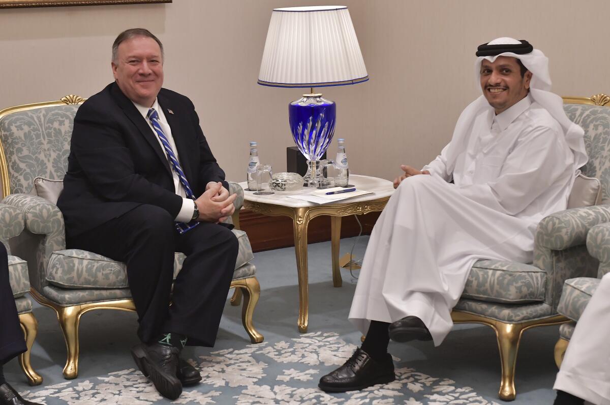 Secretary of State Michael R. Pompeo meets with Qatar's Foreign Minister Sheikh Mohammed bin Abdulrahman Al Thani before a peace signing ceremony between the U.S. and the Taliban.