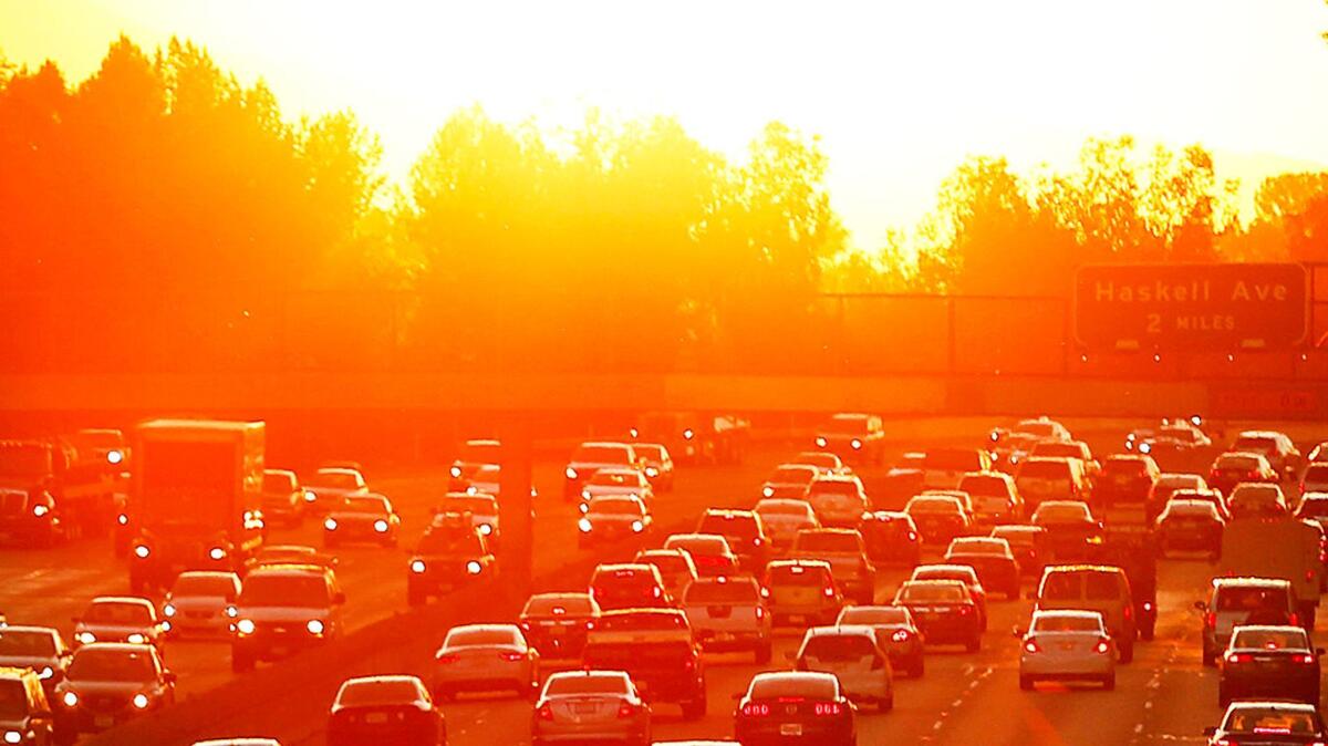 Morning traffic begins to swell in the San Fernando Valley near White Oak. Climate models suggest that by 2050, the valley could see 92 days of extreme heat per year, compared with 54 in 1990.