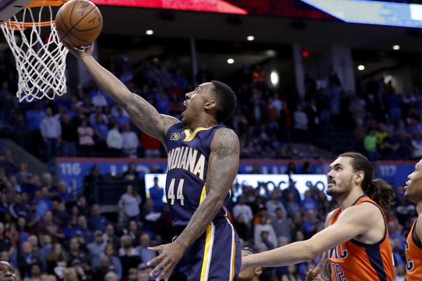 Pacers guard Jeff Teague scores two of his 30 points against the Thunder on Sunday.