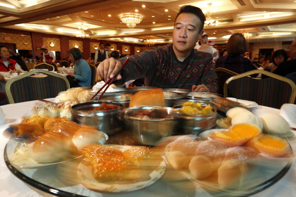 Frank Shyong with dim sum at the Ocean Star Restaurant in Monterey Park.