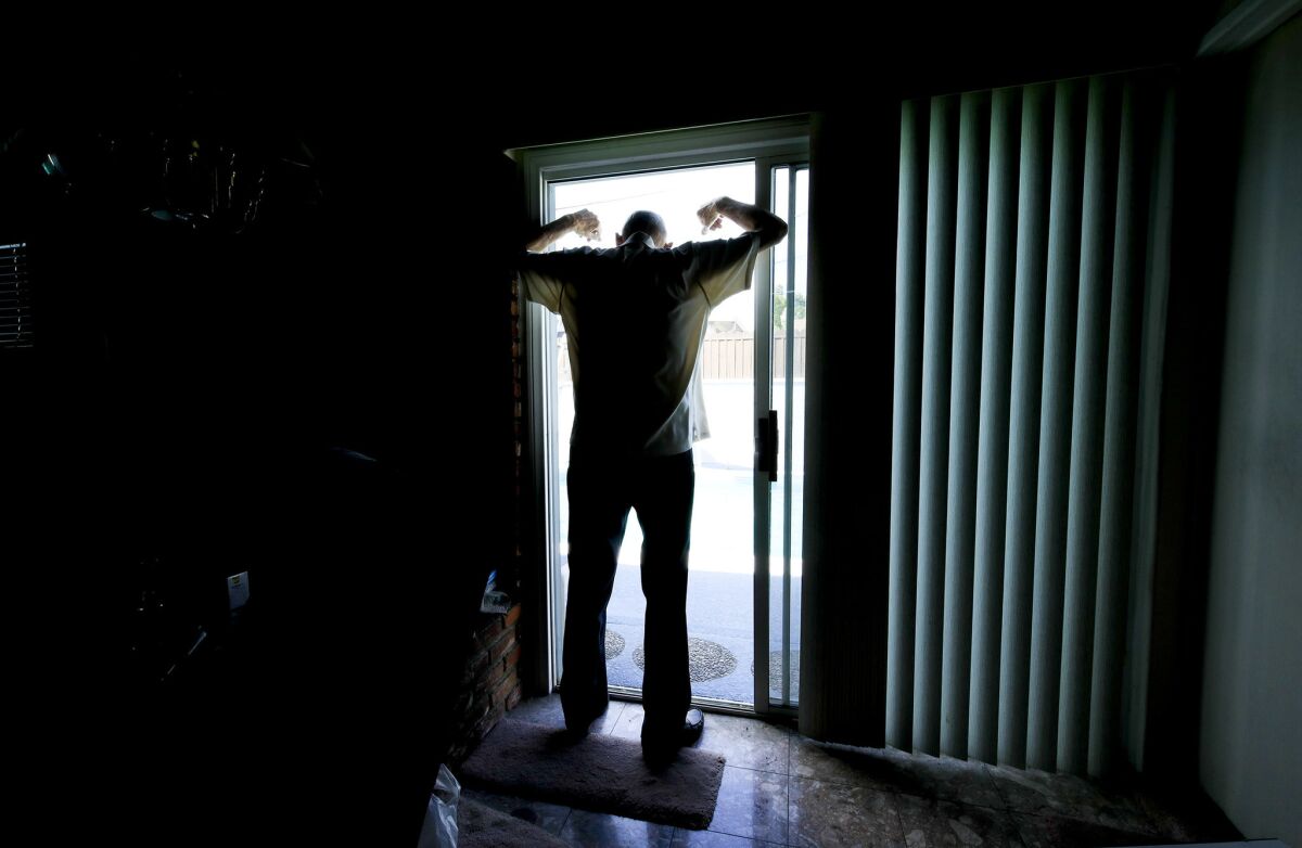 Still a lumbering figure, former Dodgers pitcher Stan Williams fills up a doorway in his Lakewood home.