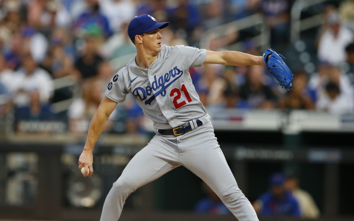 Walker Buehler (21) pitched seven strong innings in the Dodgers' 2-1 victory over New York in 10 innings.