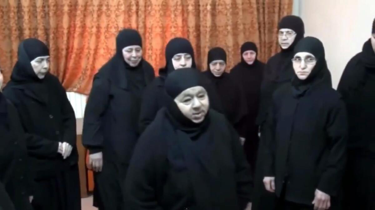 An image grab taken from a video uploaded to YouTube on Feb. 9, 2014, shows a group of nuns kidnapped by Syrian rebels.