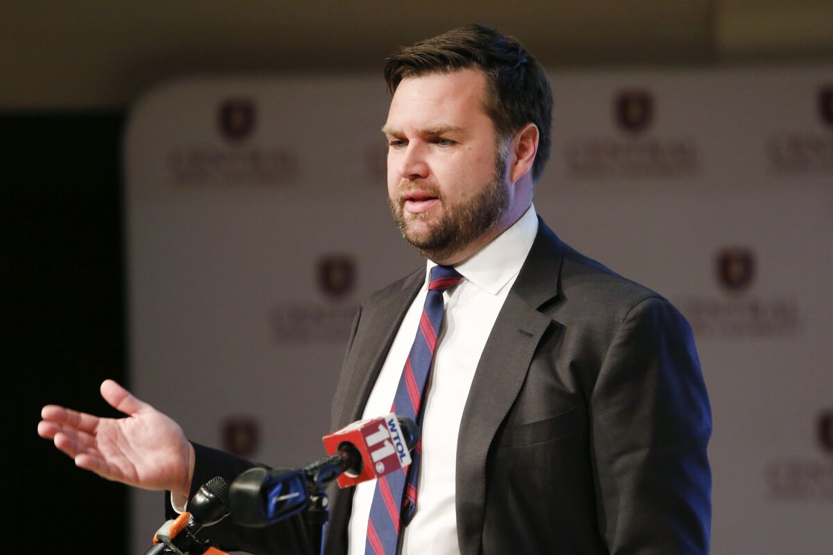FILE - J.D. Vance, a Republican running for an open U.S. Senate seat in Ohio, speaks to reporters following a debate with other Republicans at Central State University in Wilberforce, Ohio, March 28, 2022. Former President Donald Trump is endorsing "Hillbilly Elegy” author JD Vance in Ohio's competitive Republican Senate primary, ending months of jockeying in a race where his backing could be pivotal. (AP Photo/Paul Vernon, File)