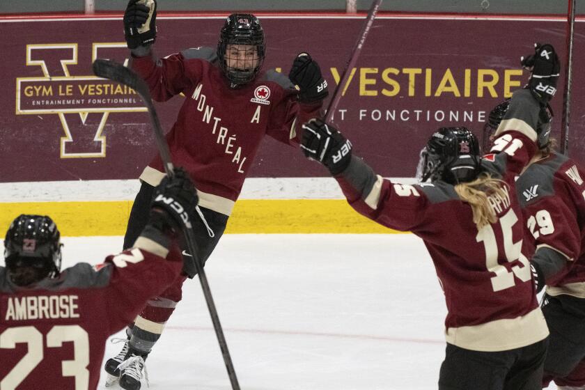Montreal's Kristin O'Neill (43) celebrates her goal against Minnesota during the third period of a PWHL hockey game Thursday, April 18, 2024, in Montreal. (Christinne Muschi/The Canadian Press via AP)