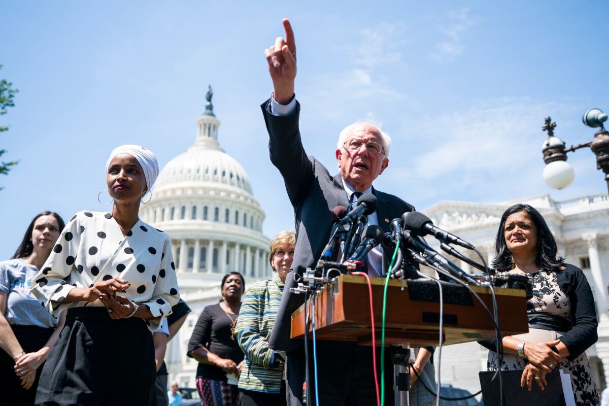 Sen. Bernie Sanders speaks about his plan to eliminate all U.S. student loan debt outside the Capitol on June 24, 2019. 