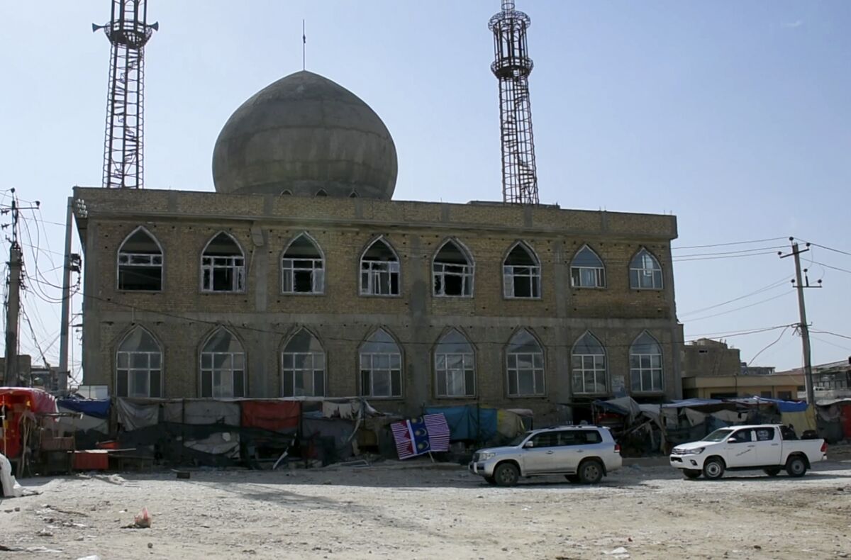 The upper-floor windows are blown out after a bomb explosion inside a mosque in Afghanistan.