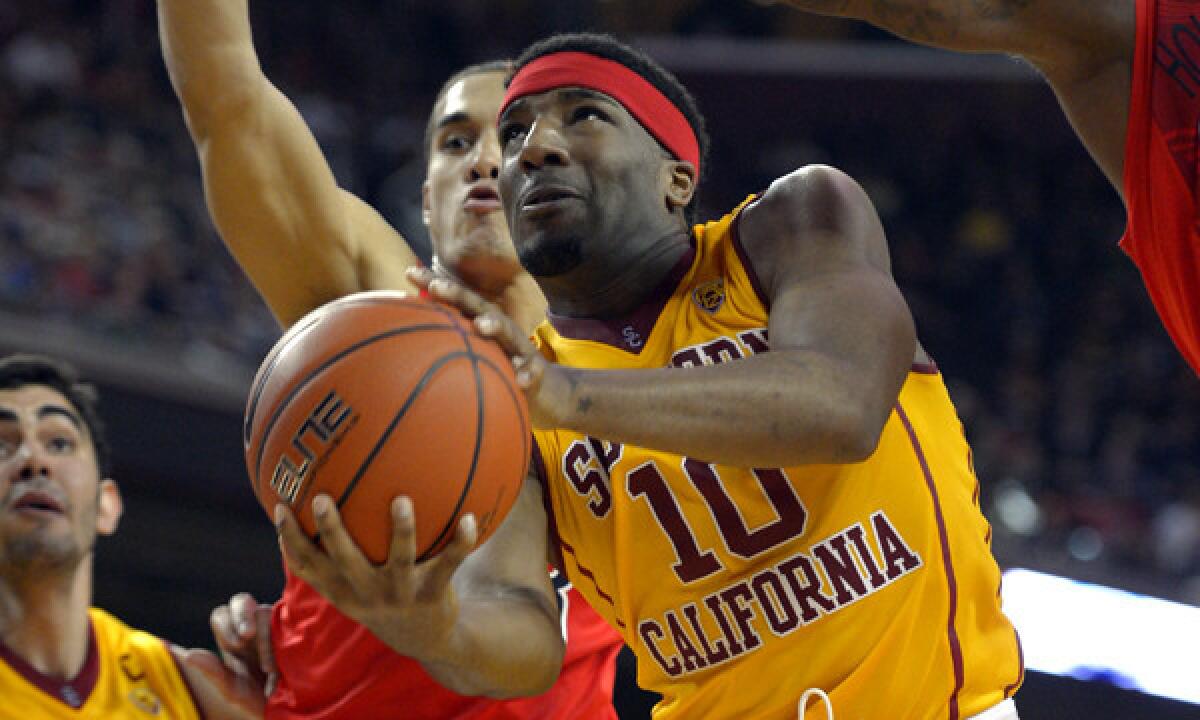 USC guard Pe'Shon Howard puts up a shot during a loss to Arizona on Jan. 12. The Trojans look to upset visiting California on Wednesday.